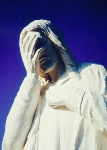 Weeping Jesus statue close up