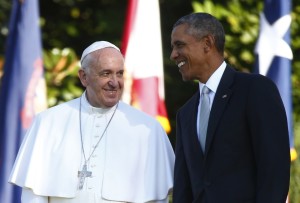 A picture of a smiling President Obama welcoming Pope Francis, also smiling, to the Whitehouse