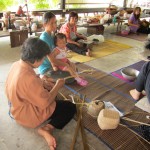 Photo of Thai women weaving baskets at the Bamboo Basketry Handicraft Centre, Chonburi Thaniland